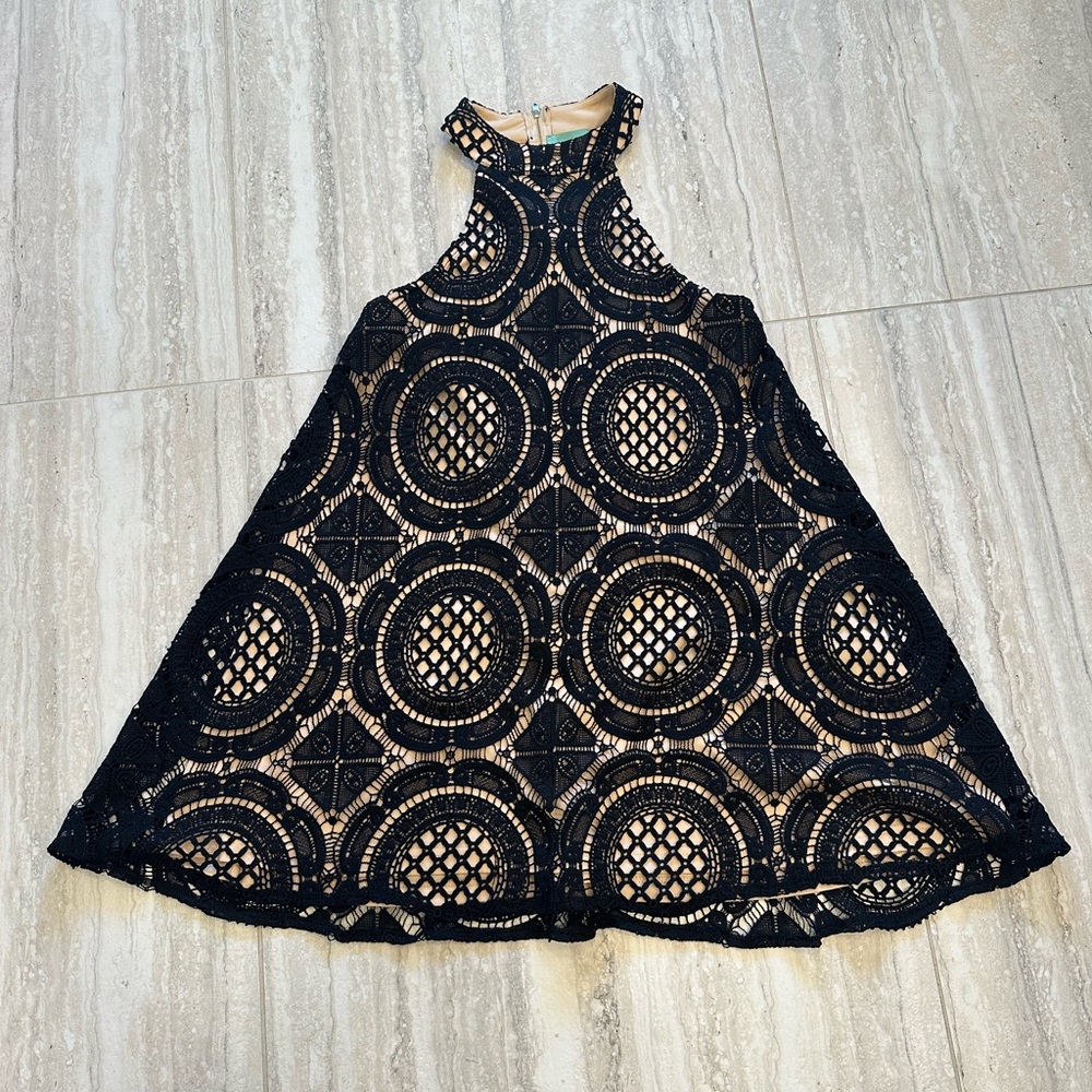 Judith March black lace swing dress.
